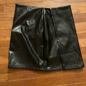 Size medium Vegan leather faux wrap mini skirt black.